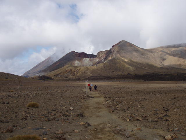 deserted valley with explorers - free image